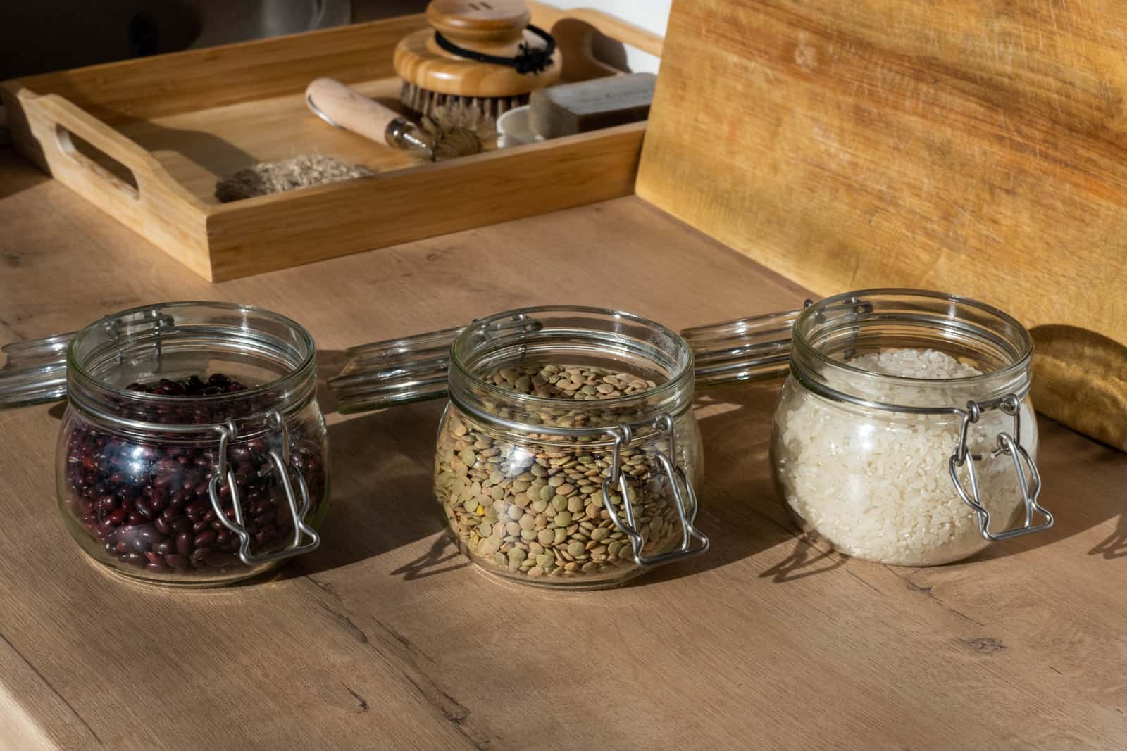 Translucent water kefir grains in a glass jar